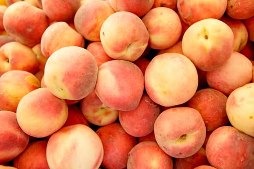 group of fresh peaches in closeup can be used as background