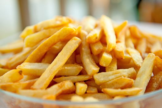 pile of baked french fries in closeup