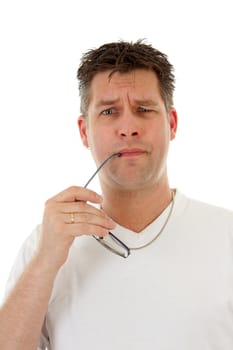 isolated man in white t-shirt is holding glasses in mouth