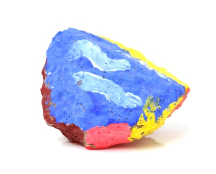 colorful stone painted by children isolated over white background