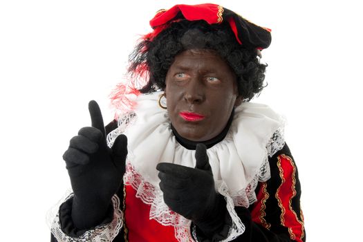 Zwarte piet ( black pete) typical Dutch character part of a traditional event celebrating the birthday of Sinterklaas in december over white background 