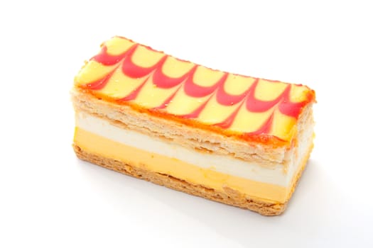 delicious yellow Tompouce pastry isolated over white background