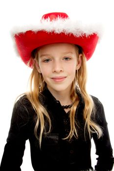 Girl with christmas hat is posing over white background