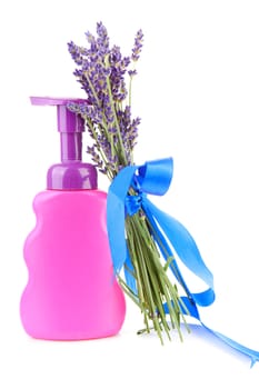 pink bottle of soap and lavender over white background
