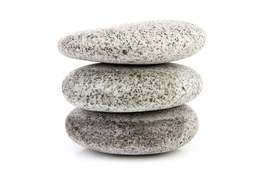 stack of grey stones over white background