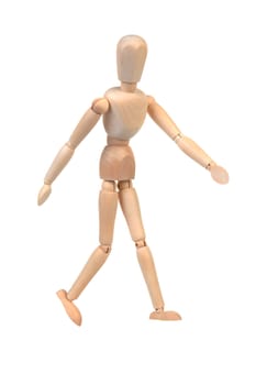 flexible wooden doll is walking over white background