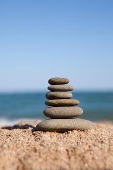 stack of stones near the ocean