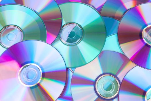background made out of compact discs CDs in closeup