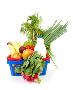 Shopping basket filled with healthy grocery over white background