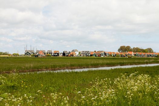 Landscape with typical Dutch houses in the village Marken
