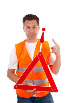 Man in safety vest holding foldaway reflective road hazard warning triangle over white background