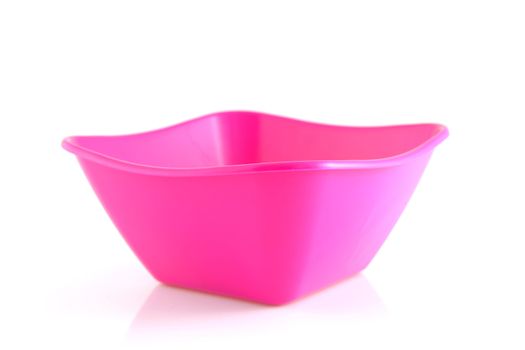 one pink empty snack bowl over white background