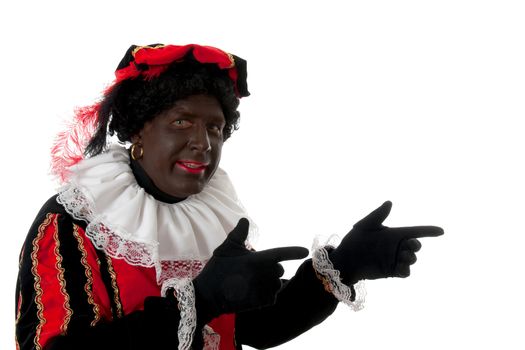 Zwarte piet ( black pete) typical Dutch character part of a traditional event celebrating the birthday of Sinterklaas in december over white background is pointing