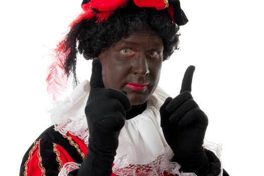 Zwarte piet ( black pete) typical Dutch character part of a traditional event celebrating the birthday of Sinterklaas in december over white background