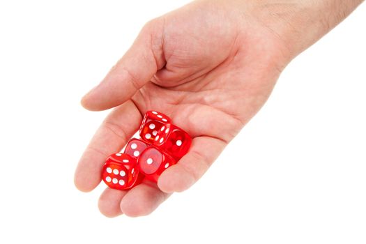 Male hand is throwing red dices over white background