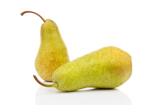 two juicy pears with water drops over white background