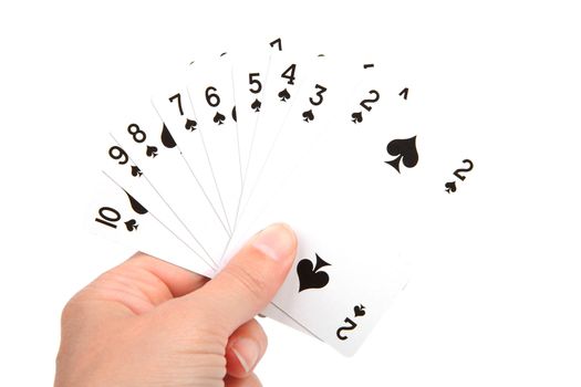 hand with playing cards over white background
