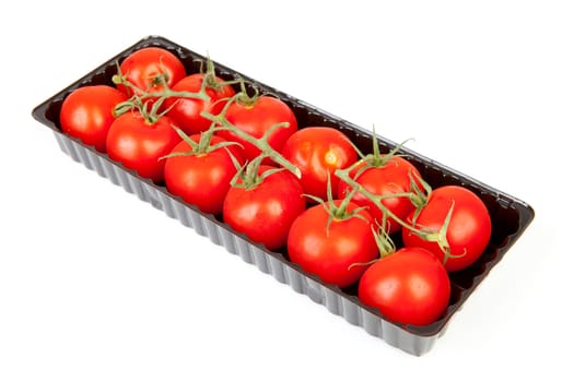 bunch of fresh tomatoes over white background