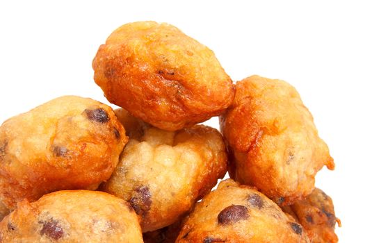 Dutch donut also known as oliebollen, traditional New Year's eve food isolated on white background