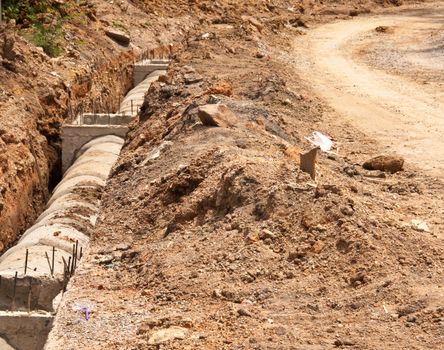 Preparation construction a drainage pipe. During excavation soil.