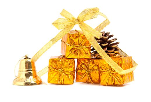 golden presents and decoration for christmas over white background