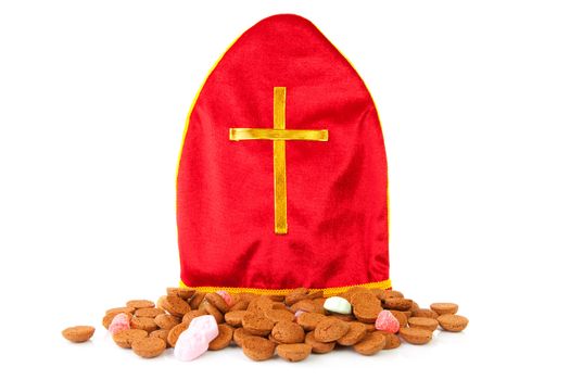 Mitre also know as mijter of Sinterklaas and pepernoten, part of typical Dutch tradition, isolated on white background