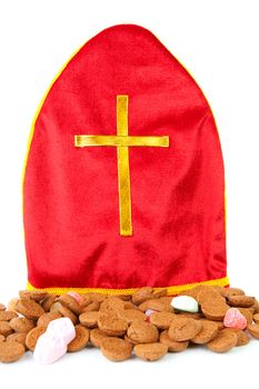 Mitre also know as mijter of Sinterklaas and pepernoten, part of typical Dutch tradition, isolated on white background