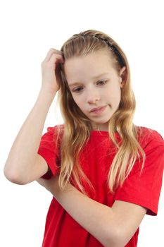 portrait of thinking young girl over white background