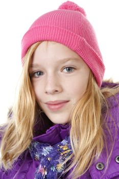 portrait of young girl in winter outfit over white background