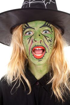 portrait of green halloween witch in closeup over white background