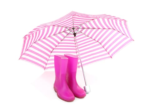 pink umbrella and rain boots isolated on white background