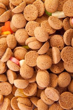 background of typical dutch sweets: pepernoten (ginger nuts) for a celebration at 5 december in the Netherlands