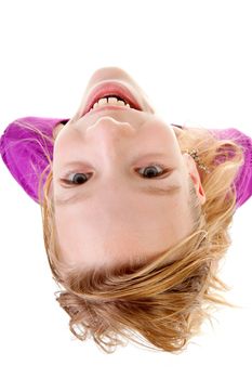teenage girl in studio seen from above, over white background
