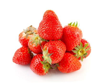 pile of fresh strawberries isolated on white background