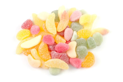 pile of colorful sugared candy over white background