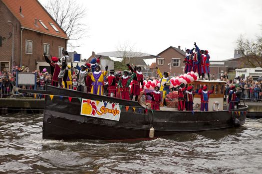 NIJKERK- NOVEMBER 13: Sinterklaas arrives in the harbor, a traditional event, november 13, 2010 in Nijkerk the Netherlands
