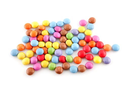 pile of colorful candy over white background