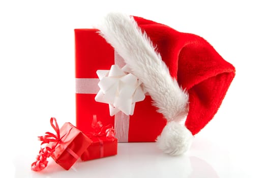 christmas presents and hat isolated on white background