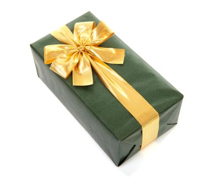 beautiful wrapped green gift with golden bow over white background