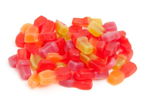pile of sweet colorful candy over white background