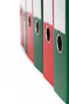 closeup of office ring binders on white background