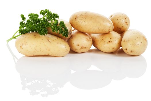 potatoes with fresh french parsley on white background