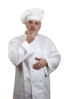 Portrait of a caucasian chef in his uniform on a white background.