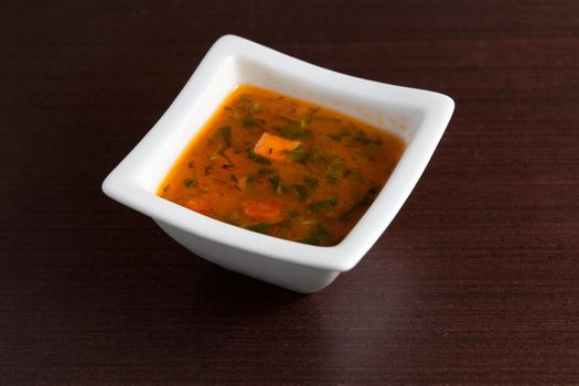 Chicken Soup on wooden table