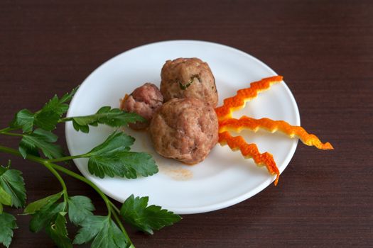 noisettes with parsley on a plate