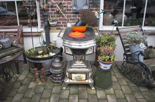 garden in holland with old tools and equipment