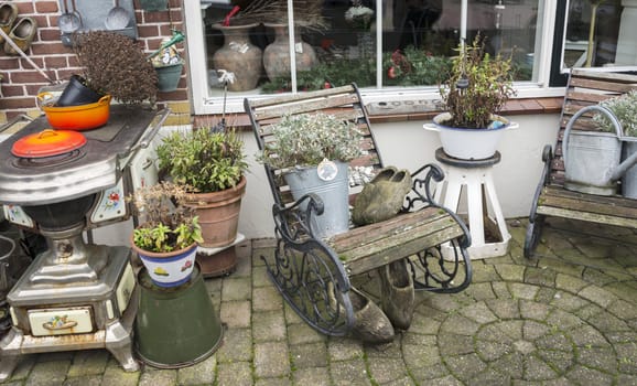 garden in holland with old tools and equipment