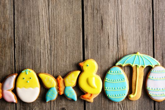 Easter homemade gingerbread cookie over wooden table