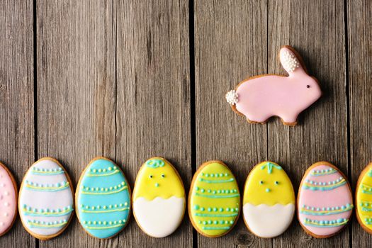 Easter homemade gingerbread cookie over wooden table