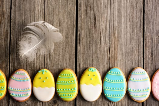 Easter homemade gingerbread cookie over wooden table